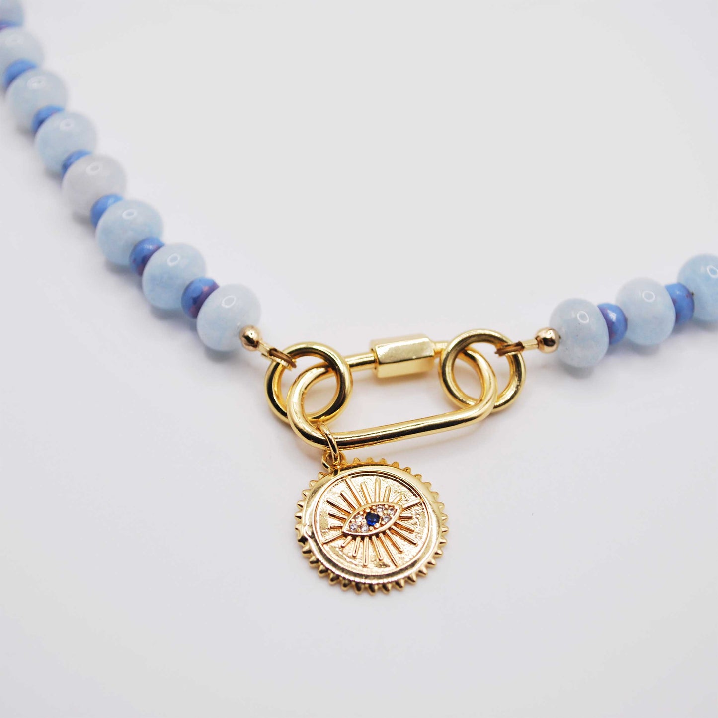 'blue eye' beaded necklace with evil eye charm and gold carabiner clasp