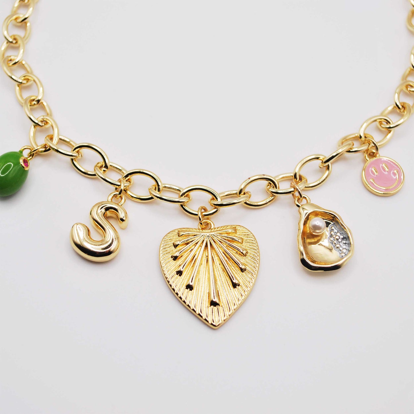 'charm collector' gold chain choker with mixed charm drop