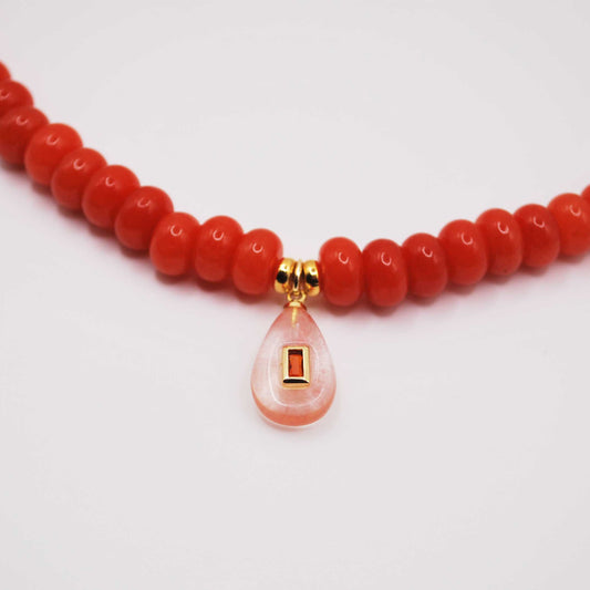'coral current' beaded necklace with rose quartz briolette charm