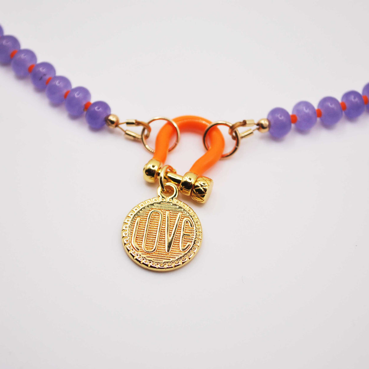 'orchid tide' lavender beaded necklace with gold love charm