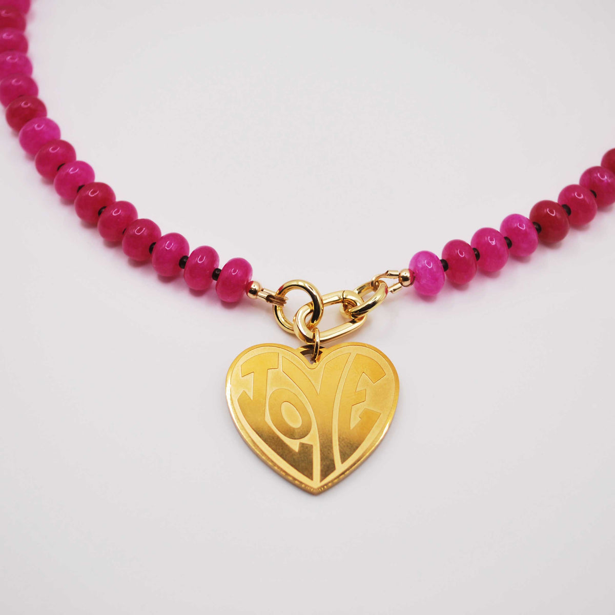 ‘island love’ pink beaded necklace with gold heart charm
