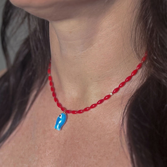 'red tide' Coral beaded necklace with blue fish charm