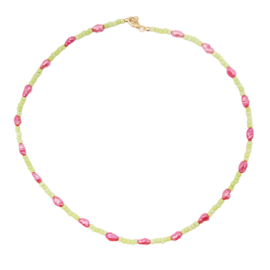 The 'pink pearl tides' choker features soft pink beads paired with luminous pearl accents, inspired by gentle tides and coastal light.