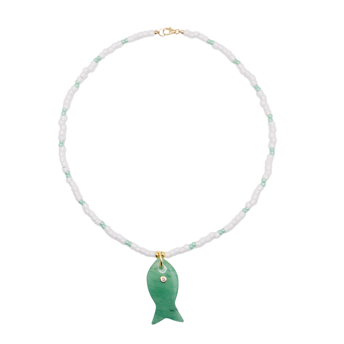 The 'seafoam minnow' necklace features soft sea-green &amp; white beads paired with a bold green fish charm,
