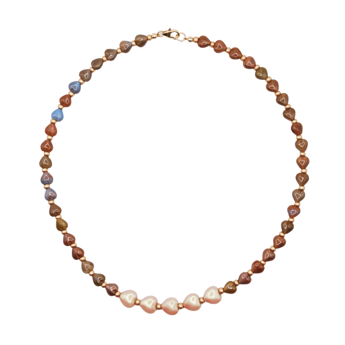 The 'tideheart' necklace blends handcrafted beads with a subtle heart accent, inspired by love shaped by the sea. 