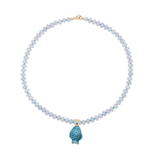Handmade Little Blue Fish necklace with opaque white rondelle beads and bold chunky fish charm