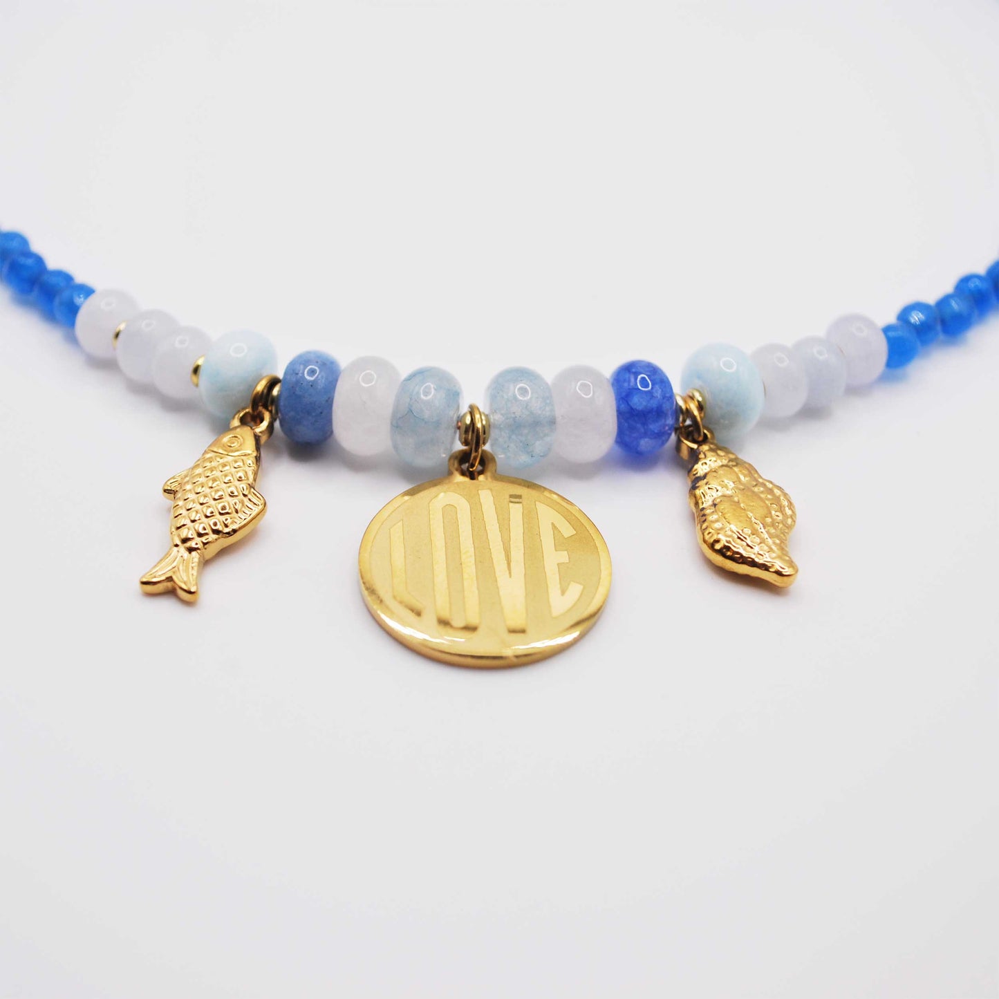 'sea of love' beaded necklace with love and coastal inspired charms