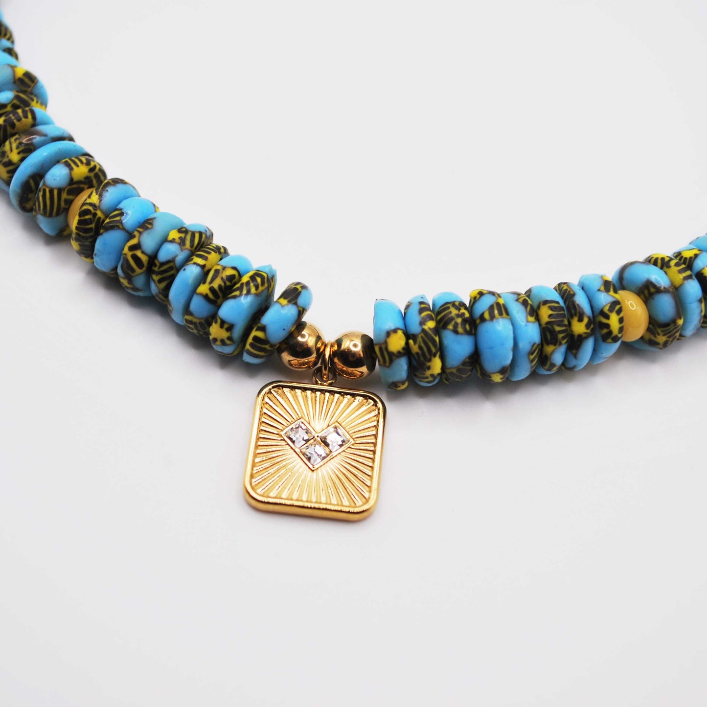 'golden hour' beaded necklace with gold sunburst charm