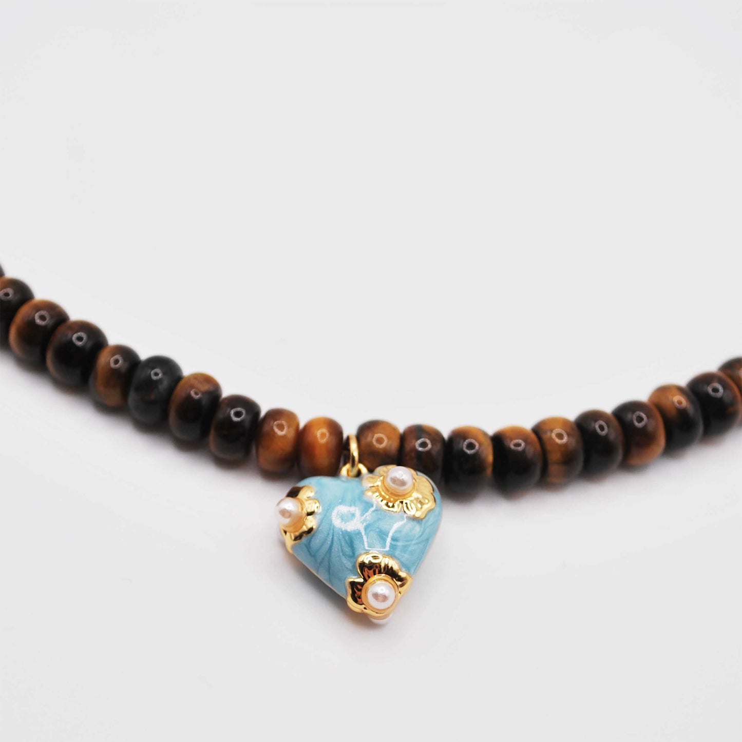 'blue cove' beaded necklace with blue heart charm with pearl accents