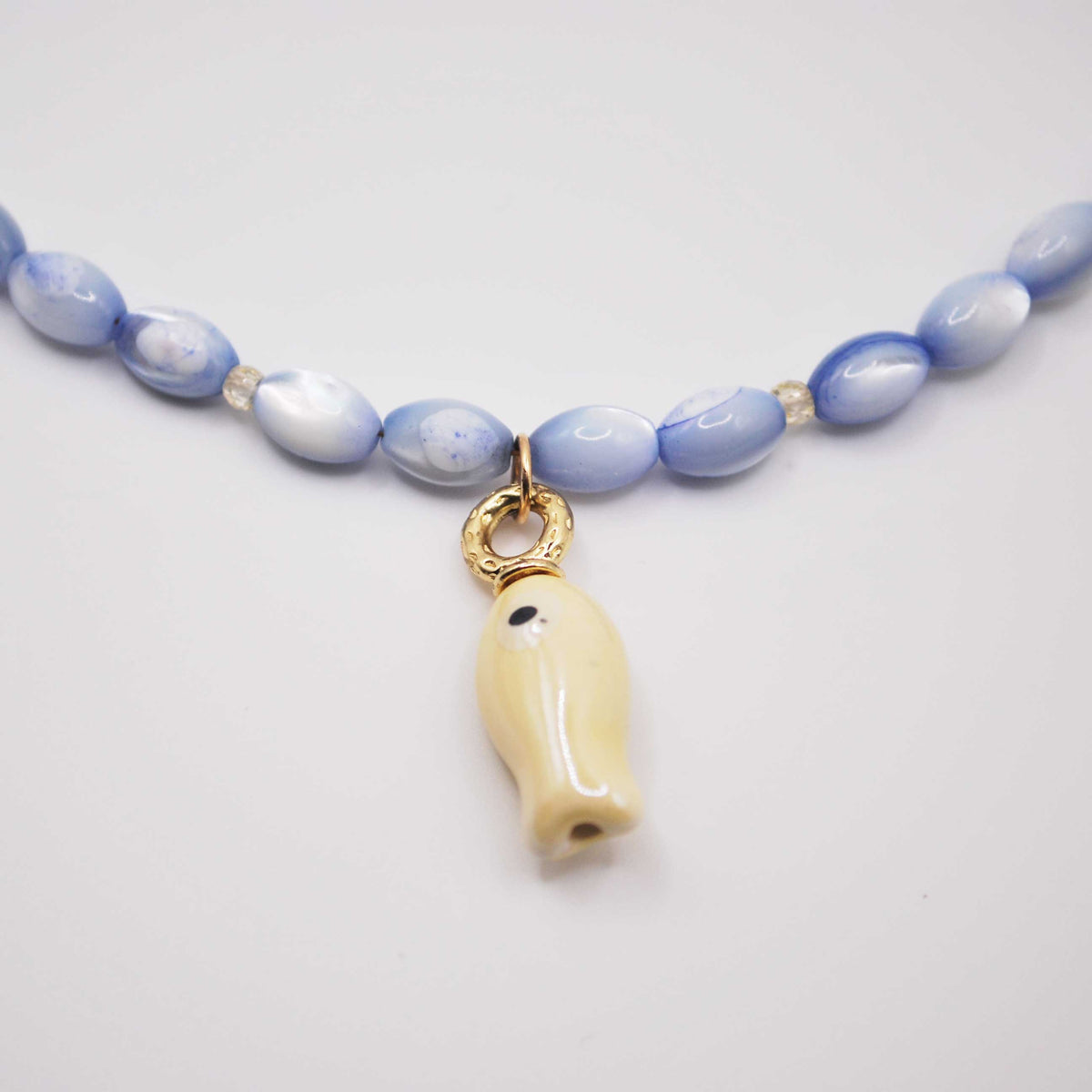 'gone fishing' blue lace agate beaded necklace with carved fish charm
