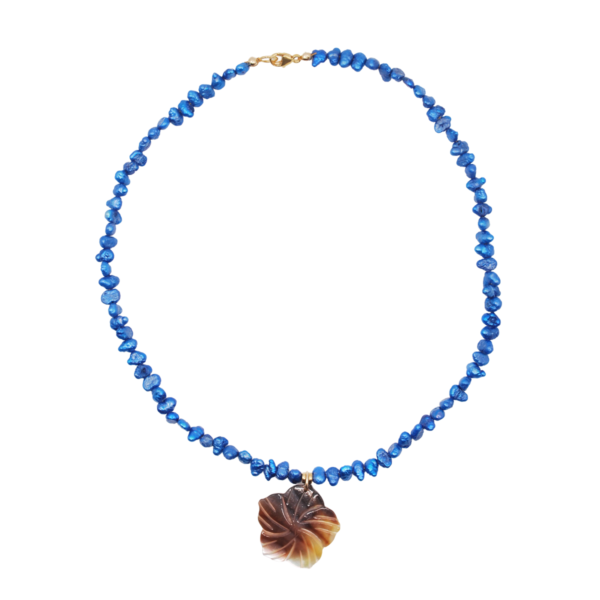 ‘twilight pearl’ blue keshi pearl necklace with carved shell pendant