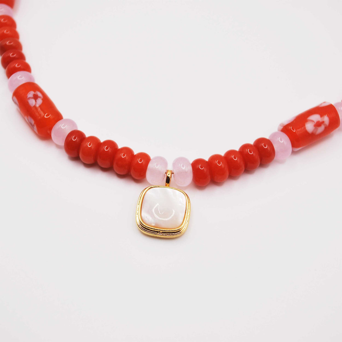 ‘scarlet blossom’ red lampwork beaded necklace with mother-of-pearl charm