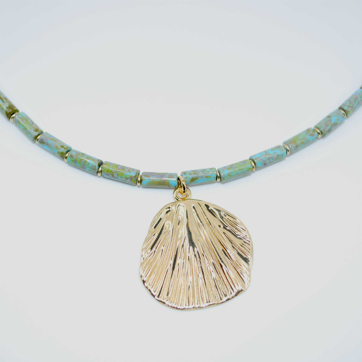 ‘low tide’ patina beaded necklace with gold shell charm