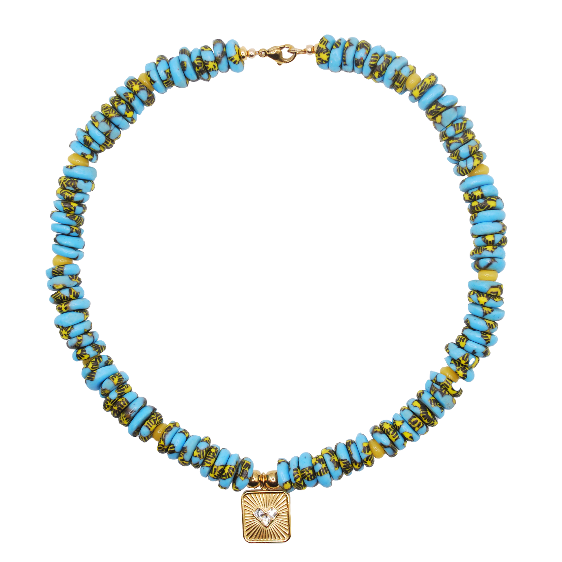 large blue beads with specs of yellow with yellow accent beads and a large sunburst charm featuring inlaid diamonds