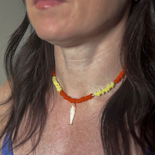 'morning tide' beaded necklace with cream-colored fish charm